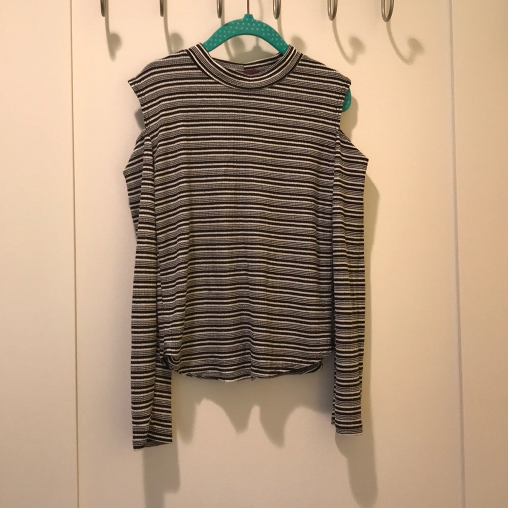 A black-and-white striped cold shoulder shirt